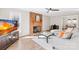 Bright living room with brick fireplace, wood floors, and plenty of sunlight at 2927 Forest Hills Cir, Rock Hill, SC 29732