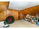 Bonus room featuring wood paneling, carpet, and a cozy atmosphere at 2968 Robinwood Rd, Gastonia, NC 28054
