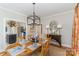 Charming dining room adjacent to the kitchen, perfect for gatherings with Gathering and friends at 2968 Robinwood Rd, Gastonia, NC 28054