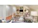 Inviting living room with bookshelves, stylish rug, and a comfortable seating area at 2968 Robinwood Rd, Gastonia, NC 28054