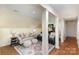 Comfortable living room with white columns, couches, and a colorful rug at 2968 Robinwood Rd, Gastonia, NC 28054