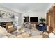 Bright and spacious living room with neutral tones, fireplace and plush seating at 2968 Robinwood Rd, Gastonia, NC 28054
