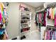 Well-organized walk-in closet with shelving and hanging storage for clothes and shoes at 2968 Robinwood Rd, Gastonia, NC 28054