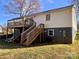 A backyard featuring a wooden deck with stairs, and green grass at 2992 Greenleaf Rd, Clover, SC 29710