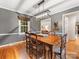 Dining room with stylish light fixture and natural light at 3725 Plumgrove Ct, Charlotte, NC 28210