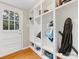 Mudroom with built-in storage for organization with access to outdoor at 3725 Plumgrove Ct, Charlotte, NC 28210