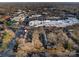 A high angle drone shot of residential units, in proximity to retail at 4310 Randolph Rd, Charlotte, NC 28211