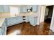 View of kitchen featuring updated cabinets and modern appliances at 506 E Ridge St, Kings Mountain, NC 28086