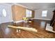 Bright living room showcasing hardwood floors, herringbone accent wall and plenty of natural light at 506 E Ridge St, Kings Mountain, NC 28086