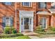 Inviting front entrance with a decorative door, sidelights, and manicured landscaping at 550 S Portman Ln, Fort Mill, SC 29708