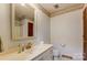 Bathroom includes a large framed mirror, double sink, and ample counter space at 623 Spring Sw St, Concord, NC 28025