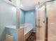 Bathroom features a soaking tub and glass shower, perfect for relaxation at 623 Spring Sw St, Concord, NC 28025
