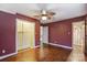 Comfortable bedroom with wood floors, closet, and access to the bathroom at 623 Spring Sw St, Concord, NC 28025