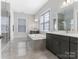 Serene bathroom with a soaking tub, walk-in shower, and dual vanities at 7206 Sumters Camp Trl, Fort Mill, SC 29707