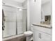 Bright bathroom with a glass shower, granite countertop, and modern fixtures at 7206 Sumters Camp Trl, Fort Mill, SC 29707