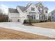 Spacious driveway and three car garage add convenience to this beautiful home at 7206 Sumters Camp Trl, Fort Mill, SC 29707