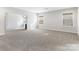 Spacious, well-lit living room offering ample space with large windows at 7206 Sumters Camp Trl, Fort Mill, SC 29707