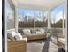 Relaxing screened-in porch with comfortable seating, offering an airy outdoor space at 7206 Sumters Camp Trl, Fort Mill, SC 29707