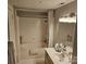 Bathroom featuring a shower-tub combo and a vanity with ample counter space at 9709 Emerald Point Dr # 2, Charlotte, NC 28278