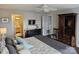 Bedroom featuring neutral decor, dark wood floors, and an en-suite bathroom at 9709 Emerald Point Dr # 2, Charlotte, NC 28278
