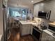 Charming kitchen with stainless appliances and open layout at 9709 Emerald Point Dr # 2, Charlotte, NC 28278
