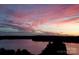 Beautiful sunset view of the lake and clouds at 9709 Emerald Point Dr # 2, Charlotte, NC 28278