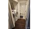 Convenient laundry area with washer, dryer, and built-in shelving at 9709 Emerald Point Dr # 2, Charlotte, NC 28278