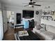 Comfortable living room with modern blue mini-fridge and stylish decor connecting to the main bedroom at 9709 Emerald Point Dr # 2, Charlotte, NC 28278