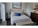 Serene bedroom featuring a comfortable bed, classic decor, and soft natural light at 9709 Emerald Point Dr # 2, Charlotte, NC 28278