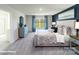 This main bedroom features a large window, patterned drapes, carpeted floors, and a tufted headboard at 106 Woodhall Way, Troutman, NC 28166