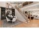 Dining room featuring stylish decor, lighting, staircase and seamless flow into the living room at 11016 Tyler Brook Ln # Oak0036, Mint Hill, NC 28227