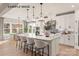 Bright kitchen with white cabinets, large central island, and stainless steel appliances at 11016 Tyler Brook Ln # Oak0036, Mint Hill, NC 28227