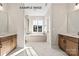 Spacious main bathroom featuring double vanities, a soaking tub, and a separate shower at 11016 Tyler Brook Ln # Oak0036, Mint Hill, NC 28227