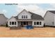Spacious backyard featuring a patio with outdoor seating, perfect for relaxing or entertaining at 11020 Tyler Brook Ln # Oak0035, Mint Hill, NC 28227