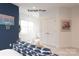 Cozy bedroom featuring a basketball theme and a view of the backyard through the window at 11020 Tyler Brook Ln # Oak0035, Mint Hill, NC 28227