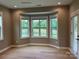 Inviting living room filled with natural light, featuring hardwood floors and a cozy atmosphere at 11020 Tyler Brook Ln # Oak0035, Mint Hill, NC 28227