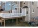 A spacious backyard deck with white railings overlooking the yard and mature trees at 11121 Timber Hill Ct, Charlotte, NC 28226
