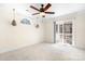 Sunlit bedroom with decorative lighting and sliding glass doors to outdoor space at 11121 Timber Hill Ct, Charlotte, NC 28226