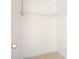 Walk in closet with installed shelving and neutral carpet at 11121 Timber Hill Ct, Charlotte, NC 28226