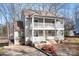 Charming two-story home featuring double balconies, a well-maintained yard, and inviting curb appeal at 11121 Timber Hill Ct, Charlotte, NC 28226