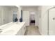Bathroom featuring double sinks, vanity, and walk-in shower at 112 Woodhall Way, Troutman, NC 28166