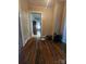 Long hallway featuring wood floors leading to other rooms at 1142 Camden Ave, Rock Hill, SC 29732