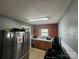 Functional kitchen featuring wood cabinets and stainless steel refrigerator at 1142 Camden Ave, Rock Hill, SC 29732