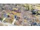 Aerial view of the home and the neighborhood, with tree-lined streets, and manicured lawns at 120 Orville Rd, Statesville, NC 28677