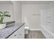 This bathroom includes a shower and tub combination, toilet, and granite countertop at 120 Orville Rd, Statesville, NC 28677