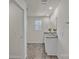 Bright bathroom vanity with double sinks, granite countertops, and a large mirror at 120 Orville Rd, Statesville, NC 28677