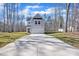 Charming two-story home with a spacious driveway and a well-manicured lawn in a serene setting at 120 Orville Rd, Statesville, NC 28677