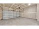 Spacious two car garage with unfinished drywall and a garage door opener at 120 Orville Rd, Statesville, NC 28677
