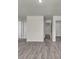 Bright hallway with hardwood floors, white trim, and multiple doorways leading to other rooms at 120 Orville Rd, Statesville, NC 28677
