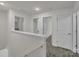 A hallway with several entryways and lots of natural light at 120 Orville Rd, Statesville, NC 28677